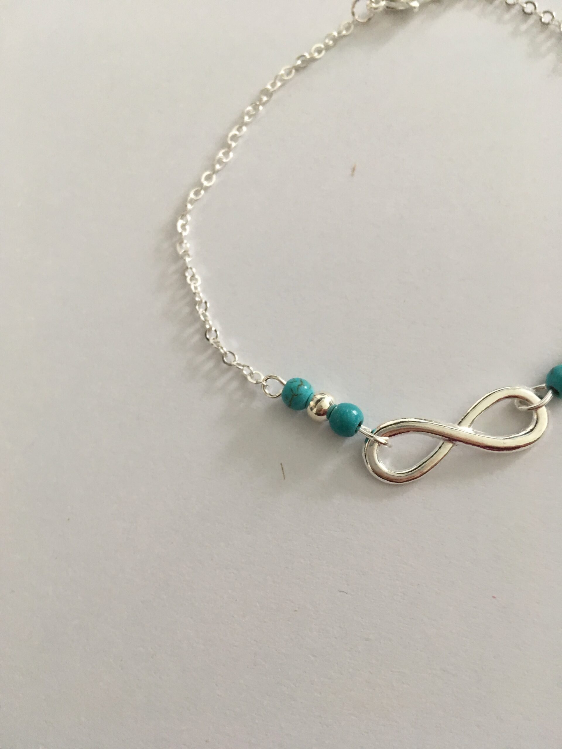 Enkelbandje infinity turquoise