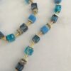 Ketting blokjes en buisjes met bijpassende armband