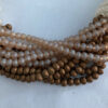 Ketting beige touw met facetkraaltjes