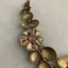 Sieradenset ketting met bijpassende clipoorbellen goudkleurig met bloem
