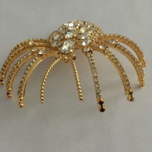 Broche goudkleurig spin groot met Swarovski steentjes