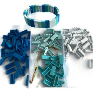 Meepakker: Doos hematiet kralen blauw, wit