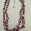 Paarse schelpketting met zilverkleurige kraaltjes