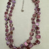 Paarse schelpketting met zilverkleurige kraaltjes