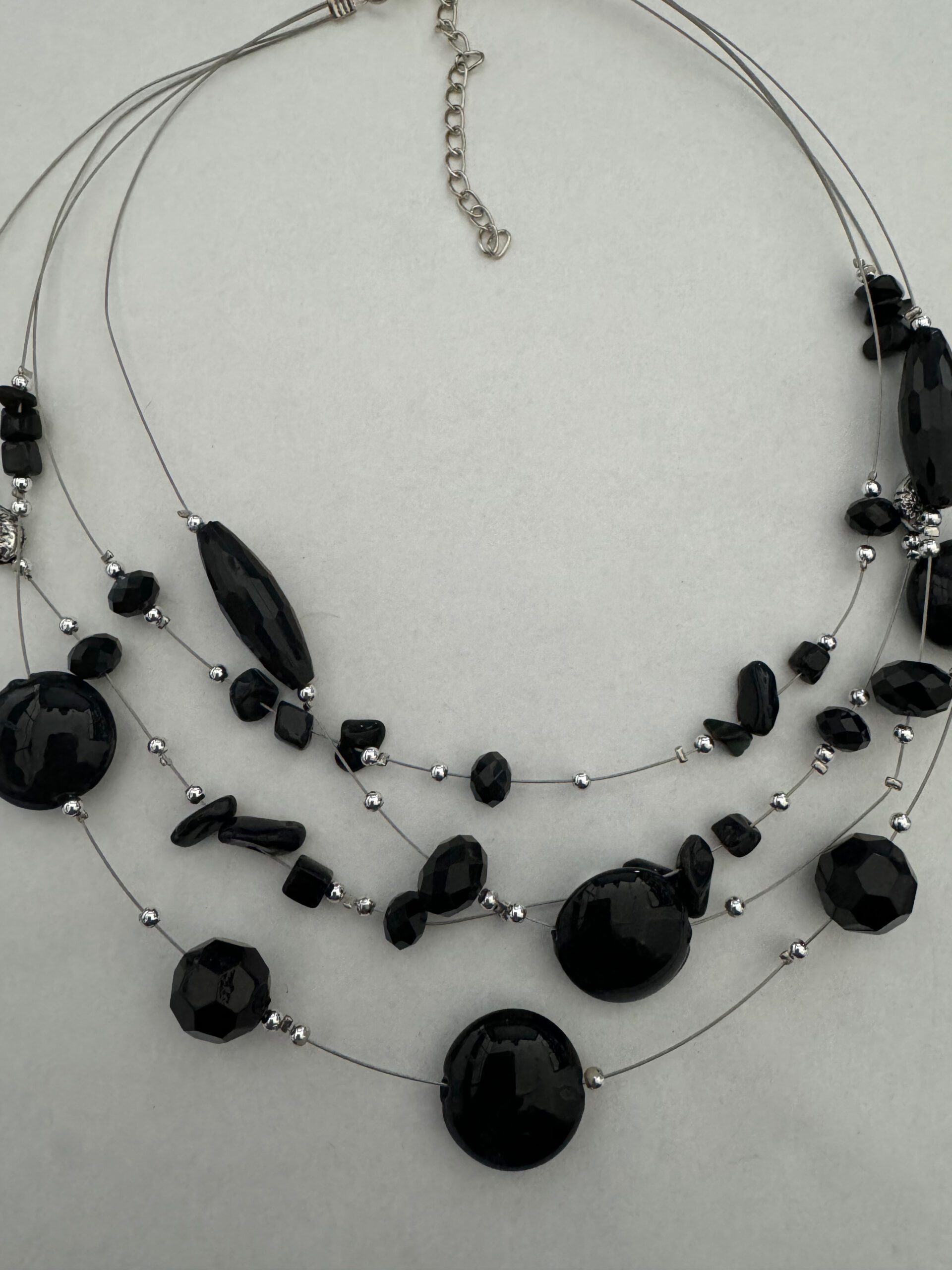 Ketting met laagjes zwart zwevend