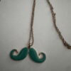 Ketting goudkleurig lang met turquoise snor