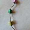 Ketting met aluminium cilinders en zilverkleurige buisjes