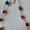 Ketting met aluminium cilinders en zilverkleurige buisjes