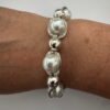 Armband met zilverkleurige verdeler en parel 