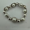 Armband met zilverkleurige verdeler en parel 