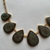 Goudkleurige ketting met druppels met strass
