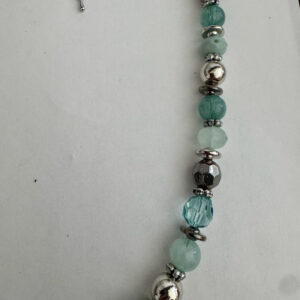 Kralenketting mintkleuren met zilverkleurige tussenkraaltjes