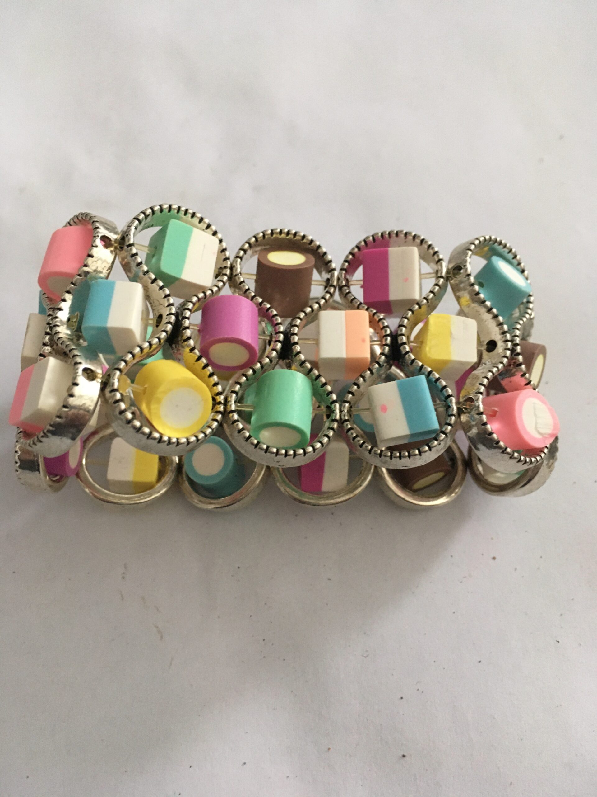 Armband infinity met fimoklei snoepjes